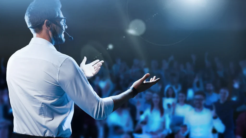 Person using expressive hand gestures while speaking confidently